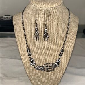 Elegant Silver Skeleton Hand Necklace and Earring Set
